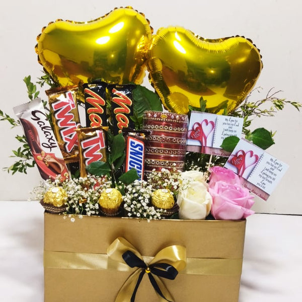 Golden Glim – roses and chocolates by Ivory Floral, same-day delivery in Lahore and Islamabad
