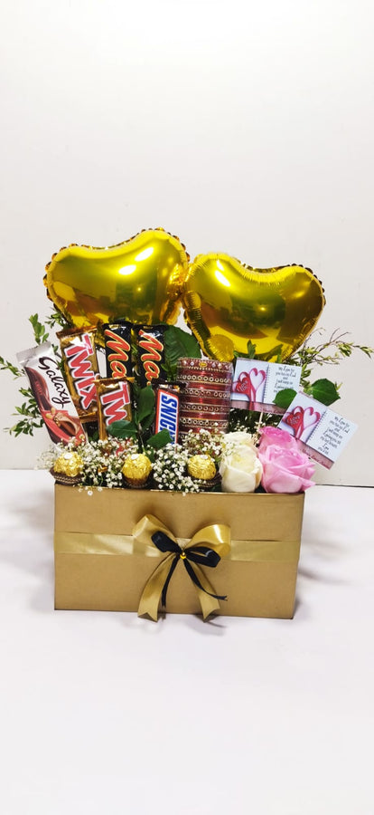 Golden Glim – roses and chocolates by Ivory Floral, same-day delivery in Lahore and Islamabad