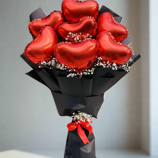 Red Elegance – heart balloon bouquet by Ivory Floral, same-day delivery in Lahore and Islamabad