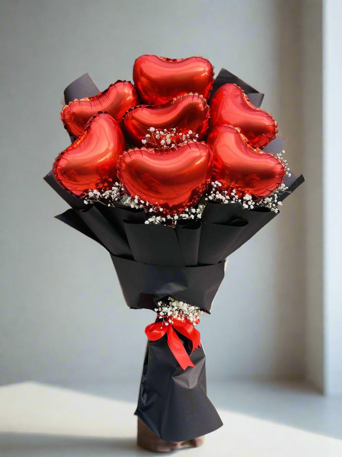 Red Elegance – heart balloon bouquet by Ivory Floral, same-day delivery in Lahore and Islamabad